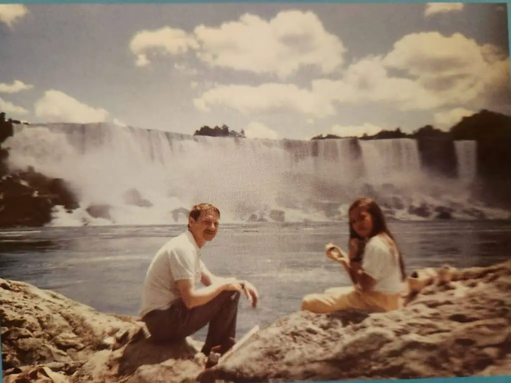 old photo of two people at Niagara Falls